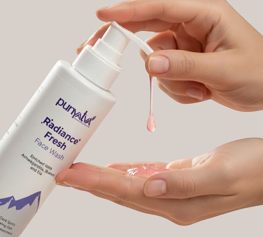 Punyava Radiance Fresh Face Wash, a clear gel formula dispensed into a hand, brightens and refreshes skin.
